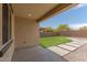 Back patio with artificial grass, stepping stones, gravel and block wall at 4150 S Neutron --, Mesa, AZ 85212