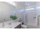 Bathroom featuring a vanity, shower-tub combo, tiled floor, and modern fixtures at 4150 S Neutron --, Mesa, AZ 85212