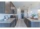 Modern kitchen featuring granite countertops, stainless steel appliances, and tile flooring at 4150 S Neutron --, Mesa, AZ 85212