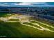 Aerial view of a modern skate park with smooth surfaces and green landscaping at 4150 S Neutron --, Mesa, AZ 85212