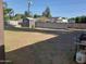 Expansive backyard with privacy fence, storage shed, and ample space for outdoor activities at 4223 E Earll Dr, Phoenix, AZ 85018