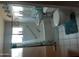 Full bathroom with shower-tub, white sink and toilet, and a plush turquoise rug at 4223 E Earll Dr, Phoenix, AZ 85018