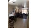Inviting open-concept living room and dining area with abundant natural light and neutral tones at 4223 E Earll Dr, Phoenix, AZ 85018
