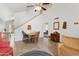 Dining area featuring tile flooring, a ceiling fan, and staircase at 440 N New Hvn, Mesa, AZ 85205