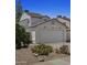 Inviting home featuring a two-car garage and low-maintenance desert landscaping at 440 N New Hvn, Mesa, AZ 85205