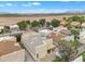 Real estate aerial showcasing home amid desert landscape, offering a unique view of property at 4545 E Wescott Dr, Phoenix, AZ 85050
