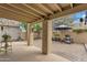 Spacious backyard offers covered patio, brick and stone accents, and a relaxing, inviting outdoor area at 4545 E Wescott Dr, Phoenix, AZ 85050