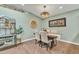 Light and bright dining room features rustic decor, hardwood floors and skylight at 4545 E Wescott Dr, Phoenix, AZ 85050