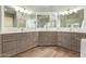 A bathroom showcasing a sleek vanity with double sinks and ample storage space, reflecting modern design at 4584 W Detroit St, Chandler, AZ 85226