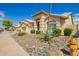 Desirable home with mature landscaping, well maintained lawn, and convenient three-car garage at 4584 W Detroit St, Chandler, AZ 85226