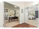 Interior view showcasing the transition from office to bedroom with neutral tones and natural light at 4584 W Detroit St, Chandler, AZ 85226