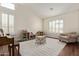 Bright and airy room with dark wood floors, shutters, lots of natural light, and neutral decor at 4584 W Detroit St, Chandler, AZ 85226