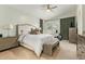 Main bedroom featuring a vaulted ceiling, neutral color palette, ceiling fan, and large windows at 4584 W Detroit St, Chandler, AZ 85226