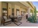 Comfortable outdoor seating on a covered patio with lush desert landscaping at 4584 W Detroit St, Chandler, AZ 85226