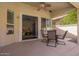 Inviting outdoor patio with ceiling fan and a dining set, perfect for relaxation at 4584 W Detroit St, Chandler, AZ 85226