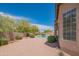 The spacious backyard features a pool, mature landscaping, and a private setting for outdoor living at 4706 E Rancho Caliente Dr, Cave Creek, AZ 85331