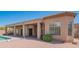 Covered patio and manicured landscaping for this exterior view at 4706 E Rancho Caliente Dr, Cave Creek, AZ 85331