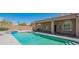 A serene pool and patio area provide a perfect spot for outdoor entertainment and relaxation at 4706 E Rancho Caliente Dr, Cave Creek, AZ 85331