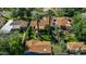 Aerial view showcasing a home with mature trees, colorful flowers, and a well-manicured yard at 512 W Roma Ave, Phoenix, AZ 85013