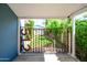 Unique mid-century modern design gate with house numbers in the carport area at 512 W Roma Ave, Phoenix, AZ 85013