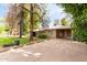 Charming single-story home with mature trees and a spacious driveway at 523 W 14Th St, Tempe, AZ 85281