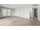 Bright living room showcasing wood-look floors, neutral paint scheme, and open floorplan at 523 W 14Th St, Tempe, AZ 85281