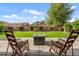 Outdoor living space featuring manicured lawn and fire pit at 5330 W Morgan Pl, Chandler, AZ 85226
