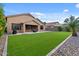 This home features an artificial lawn in the backyard at 5330 W Morgan Pl, Chandler, AZ 85226