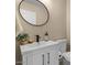 Clean bathroom with modern sink, mirror, and toilet with built in storage at 5330 W Morgan Pl, Chandler, AZ 85226