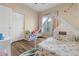 Playful bedroom with whimsical decorations, window, and comfortable bedding at 5330 W Morgan Pl, Chandler, AZ 85226