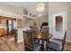 Cozy breakfast nook featuring a wood table, chairs, and stainless steel appliances at 5330 W Morgan Pl, Chandler, AZ 85226