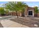 Attractive home featuring a three-car garage with low-maintenance desert landscaping at 5330 W Morgan Pl, Chandler, AZ 85226
