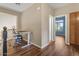 Upstairs hallway with desk and chair, great for studying, and dark wood-look flooring at 5330 W Morgan Pl, Chandler, AZ 85226