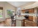 Bright kitchen with stainless steel appliances and breakfast nook with backyard view at 5330 W Morgan Pl, Chandler, AZ 85226