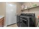 Laundry room featuring a gray washer and dryer at 5330 W Morgan Pl, Chandler, AZ 85226