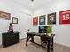 Functional bedroom featuring a desk and athletic themed wall decor creating an inspiring space at 5457 S Benton --, Mesa, AZ 85212
