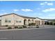 Charming single-story home with a well-manicured front yard, arched entryway and three-car garage at 5457 S Benton --, Mesa, AZ 85212