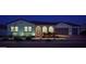 Charming home exterior with manicured landscaping, well-lit entrance, and a welcoming facade at 5457 S Benton --, Mesa, AZ 85212