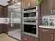 Gourmet kitchen with built-in stainless steel appliances and ample cabinet space at 5457 S Benton --, Mesa, AZ 85212