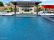 Stunning pool with a waterfall feature and comfortable lounge area, perfect for relaxation at 5457 S Benton --, Mesa, AZ 85212