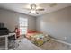 Functional bedroom with a neutral color scheme, perfect for relaxation and study at 5831 W Saragosa St, Chandler, AZ 85226