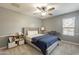 Cozy bedroom with a gray color scheme, offers a versatile and comfortable space at 5831 W Saragosa St, Chandler, AZ 85226