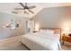 Calm main bedroom featuring vaulted ceiling, soft lighting, and ensuite bathroom access at 5831 W Saragosa St, Chandler, AZ 85226