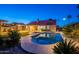 Inviting pool with baja step, spa, pergola, and covered patio, perfect for outdoor relaxation at 5831 W Saragosa St, Chandler, AZ 85226