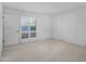 Bright bedroom with a large window, a neutral color palette, and ample natural light, creating a serene atmosphere at 6011 N 2Nd St, Phoenix, AZ 85012
