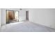Bright living room with a glass sliding door leading to a private courtyard offering a cozy, private retreat at 6011 N 2Nd St, Phoenix, AZ 85012