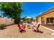 Spacious backyard with patio furniture, firepit, and pool creating an inviting outdoor oasis for relaxing and entertaining at 6533 E Kelton Ln, Scottsdale, AZ 85254