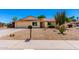Charming single-story home with desert landscaping and a well-maintained front yard at 6533 E Kelton Ln, Scottsdale, AZ 85254