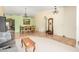 Cozy living room showing tile floors, chandeliers and dining room transition at 6533 E Kelton Ln, Scottsdale, AZ 85254