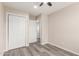 Bedroom featuring a closet with sliding doors and neutral walls and flooring at 655 E Hondo Ave, Apache Junction, AZ 85119
